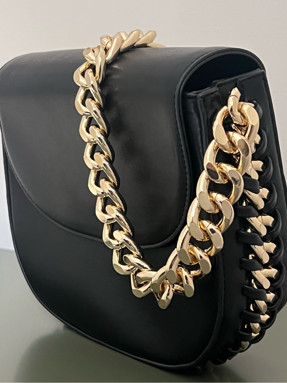 Express Black Shoulder Saddle Bag with Gold Chain